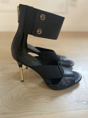 Cecelia New York Mirror Black Open Toe Gold Stiletto Heel Stretch Strap Sandals