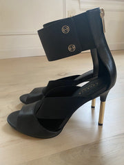 Cecelia New York Mirror Black Open Toe Gold Stiletto Heel Stretch Strap Sandals