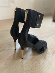 Cecelia New York Mirror Black Open Toe Gold Stiletto Heel Stretch Strap Sandals